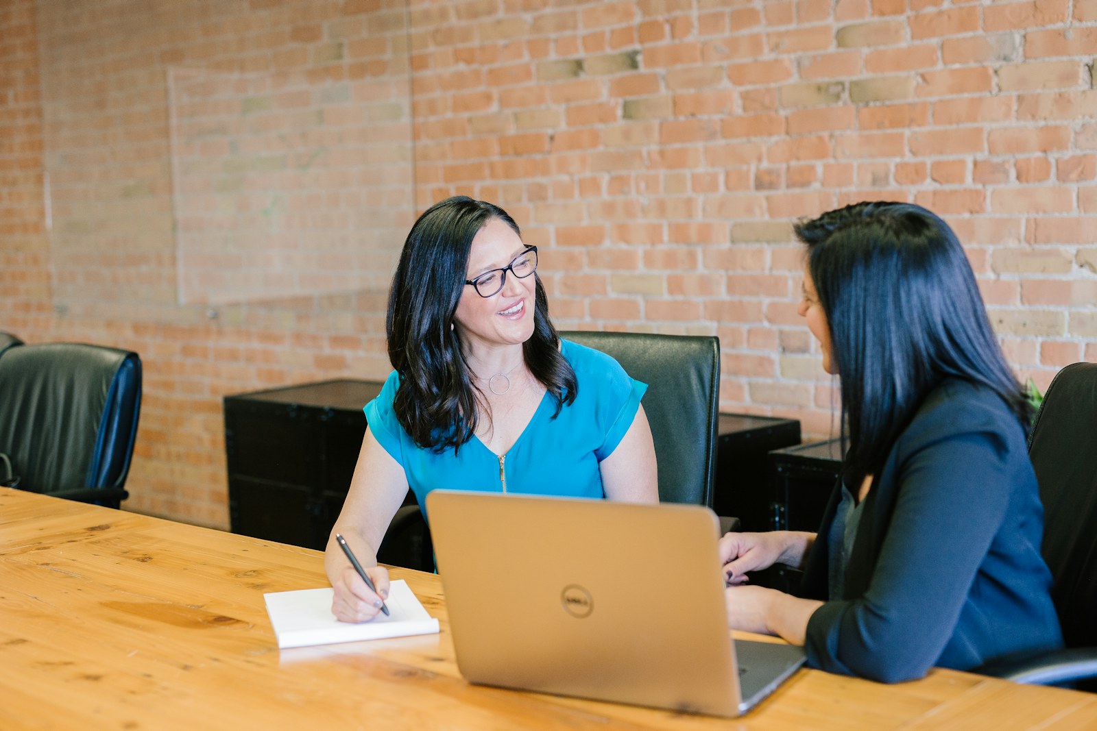 Business leaders reviewing a hiring mandate together